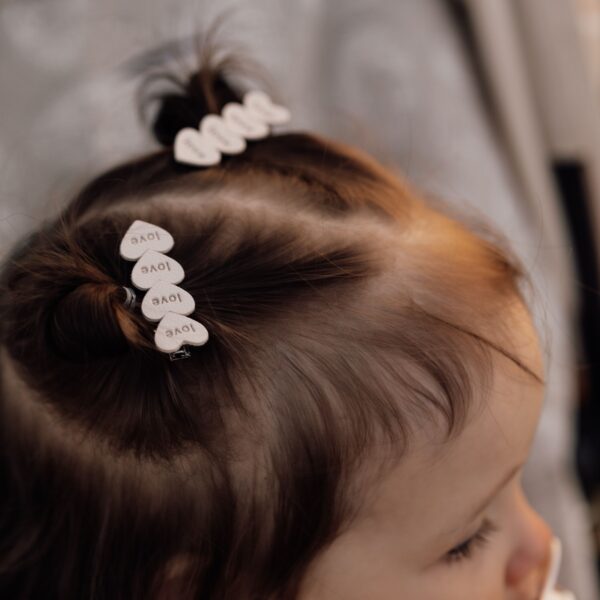 Alligatorspeldje |  Love is in the Hair