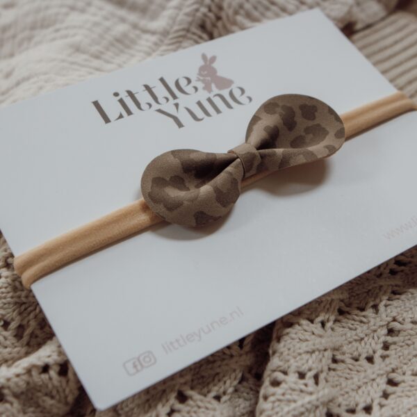 Baby haarbandje met zachte panterprint strik op beige bandje