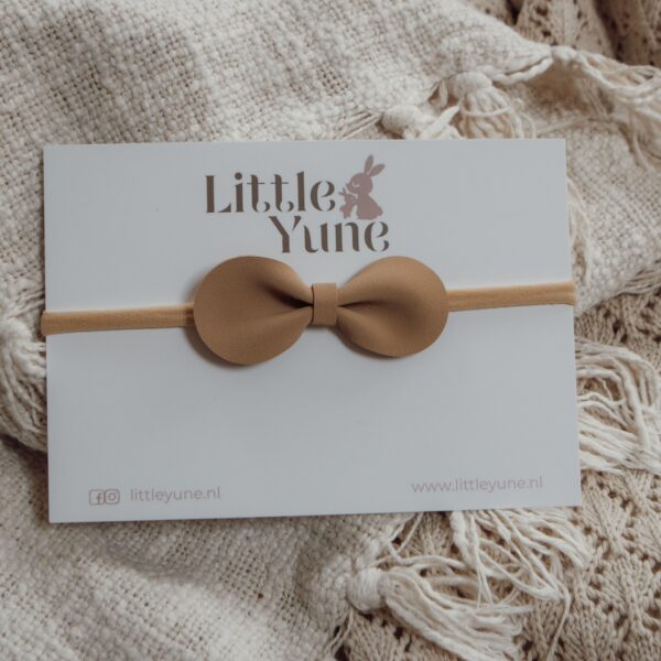 Baby haarbandje met effen taupe strik op zacht beige bandje